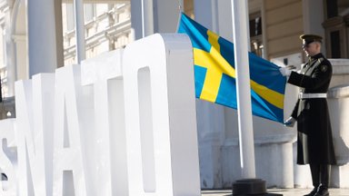 Swedish flag raised in front of National Defence Ministry