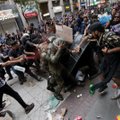 Čilės sostinėje per protesto akciją nukentėjo penki policininkai