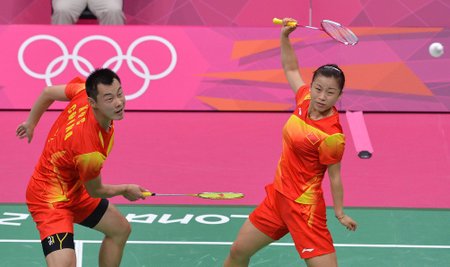 Badmintoninkai Xu Chen ir Ma Jin