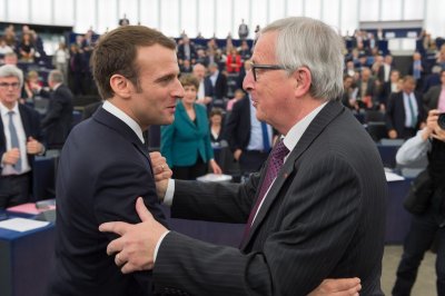Emmanuelis Macronas ir Jeanas-Claude'as Junckeris