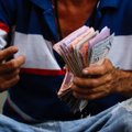 Venesuelos ekonomiką ištiko katastrofa: vidutinis uždarbis per mėnesį – vos 6,5 dolerių