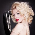 M.Monroe patarimas, kaip pradžiuginti mylimąjį lovoje