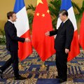 Macronas su EK vadove vyks derybų pas Xi Jinpingą