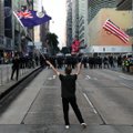 Honkonge protestuotojai grįžo į gatves ir dėkojo JAV