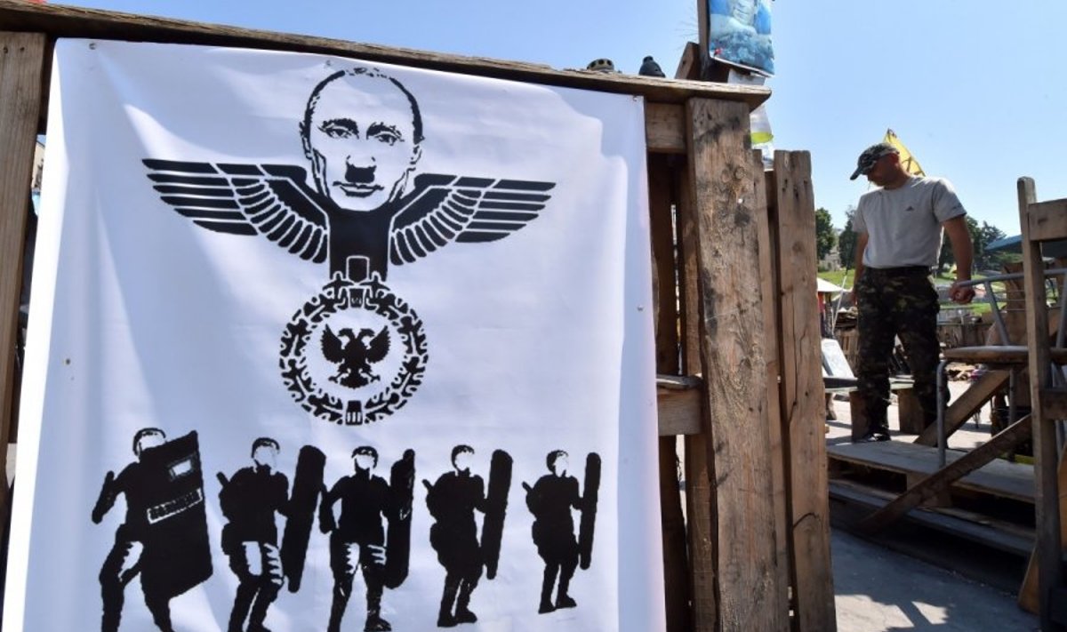 V. Putiną vaizduojantis plakatas Maidane