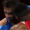 Akibrokštas olimpiniame ringe: boksininkas bandė pakartoti skandalingą Tysono manevrą