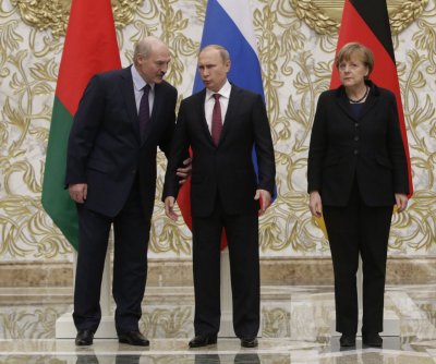 A. Lukašenka V. Putinas ir A. Merkel