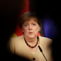 Merkel lankosi Baltuosiuose rūmuose