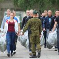 Reinstating conscription in Lithuania: bringing society back into defence?