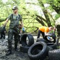 Kaune iš Amalės upelio ištraukta daugiau nei 3 tonos padangų