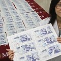 Specialistė Taivane per savaitę suklijavo 200 susmulkintų banknotų skutelius