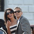 Jaunavedžiai Clooney po tobulų vestuvių pademonstravo žiedus