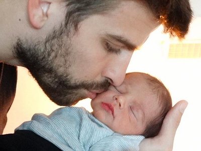 Gerardas Pique su sūnumi Milanu (Unicef nuotr.)