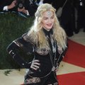 Madonna apie motinystę ir vaikų auklėjimą: namuose esu „blogasis policininkas“