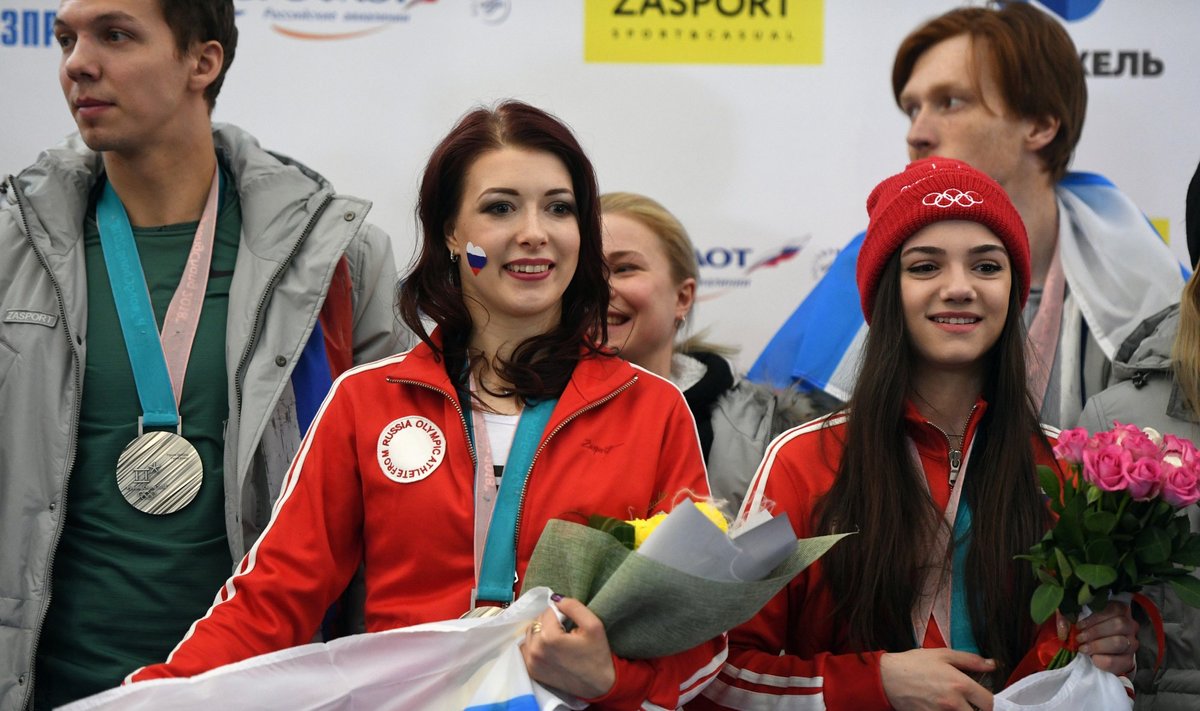 Rusija grįžusius olimpinius atletus sutiko kaip didvyrius