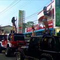 Politiko laidotuvės Taivane: go-go šokėjos ant visureigių, orkestras ir milžiniškos lėlės