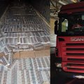 Ugniagesiai padėjo muitininkams išardyti „tuščią“ vilkiką Lavoriškėse: slėptuvėje – 150 tūkst. eurų vertės cigarečių siunta