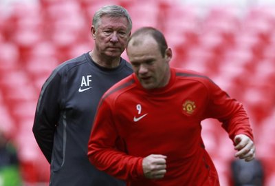 W. Rooney ir A. Fergusonas