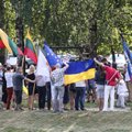 Lithuanian liberals stage protest outside Russian Embassy