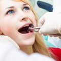 Išbandykite šias penkias lengvas namines priemones nuo protinio danties skausmo
