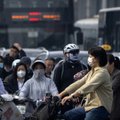 Kinijoje kyla nauja pandemijos banga – dešimtys milijonų susirgimų per savaitę