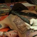 Paryžiaus tatuiruočių festivalyje drobes atstojo kūnai