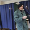 Durys atsidaro: rinkimų apylinkės darbas iš arti