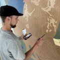 Mokyklos jau ruošiasi mokslo metams: Radviliškio gimnazijos sieną papuošė mokinio sukurtas piešinys