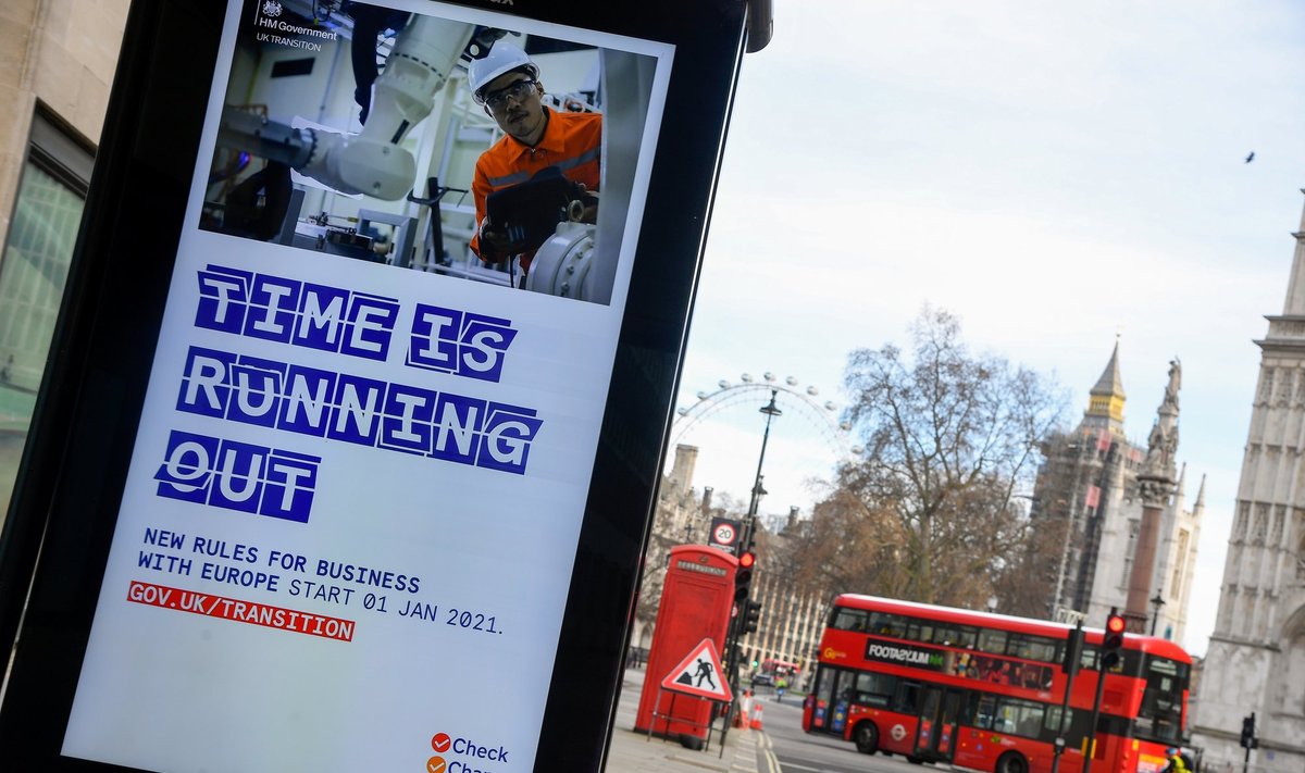 A British government informational poster is seen on a bus stop, amid the coronavirus disease (COVID-19) pandemic, in London, Britain, December 30 2020.