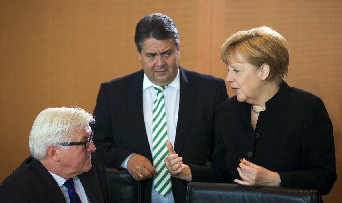 Germany’s Foreign Minister Frank-Walter  Steinmeier, Minister of Economics Minister Gabriel and Chancellor Angela Merkel 