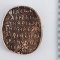 Aptiktas senovinis amuletas su paslaptingu palindromu