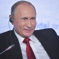 Kodėl V. Putinas šypsosi?